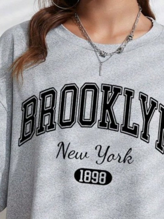 Women Printed Drop-Shoulder Sleeves Oversized T-Shirt – Stylish Cotton Wear Pakistan