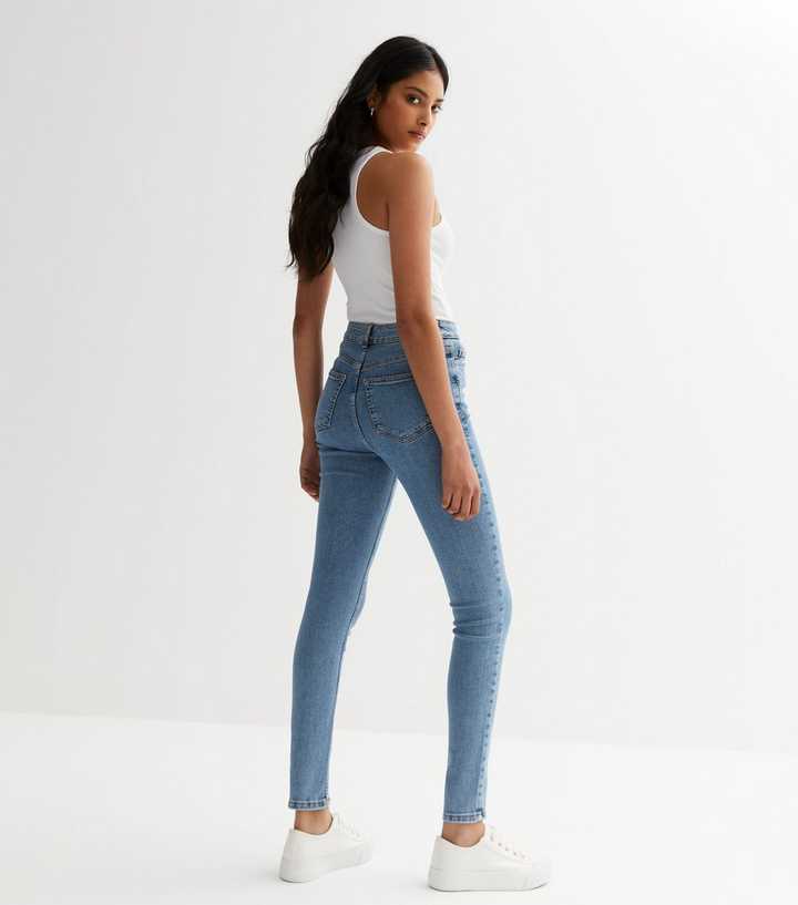Blue Mid Rise Amie Skinny Jeans - DENIMS