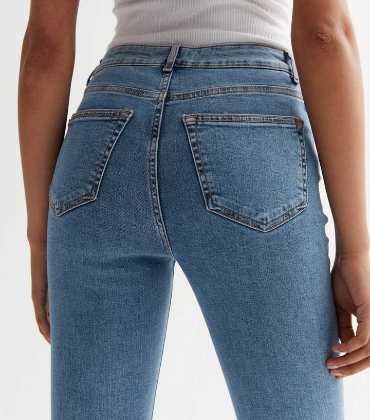 Blue Mid Rise Amie Skinny Jeans - DENIMS