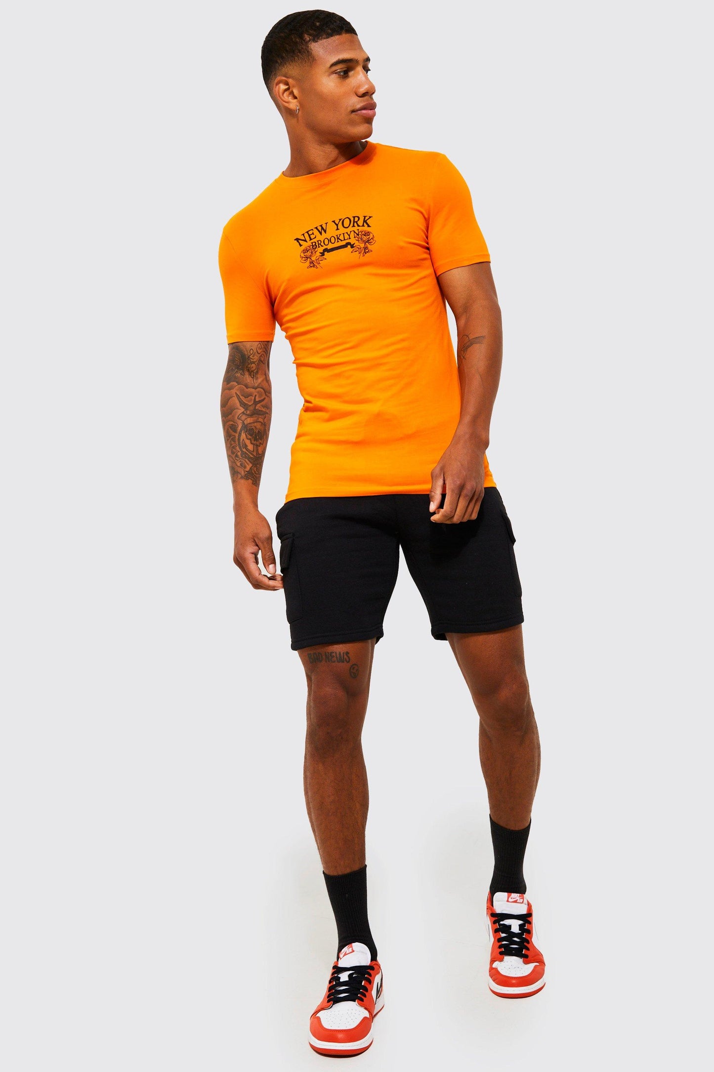SLIM MID CARGO BLACK JERSEY SHORT