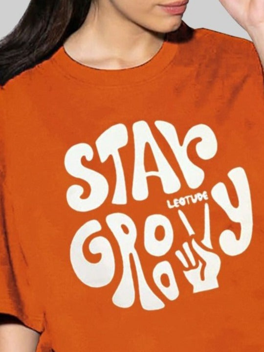 Women Typography Printed Round Neck Cotton Oversized T-Shirt – Trendy Streetwear in Pakistan