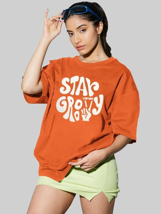 Women Typography Printed Round Neck Cotton Oversized T-Shirt – Trendy Streetwear in Pakistan