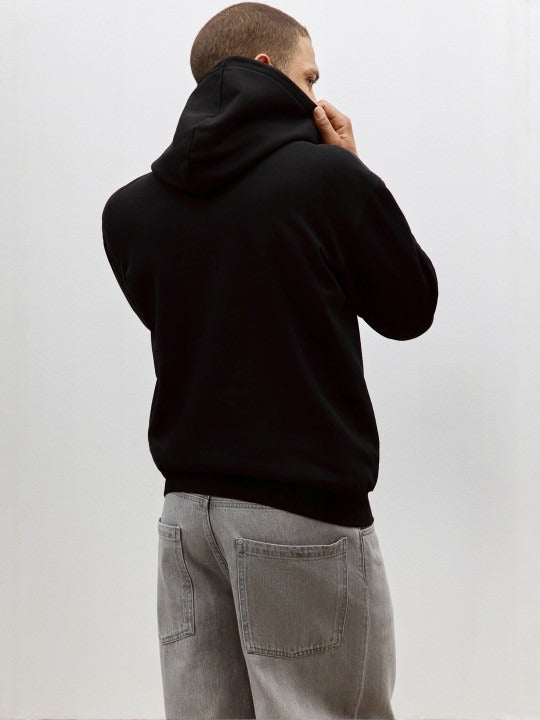 Men Black Relaxed Fit Hoodie – Comfortable Streetwear Style in Pakistan | DENIMS